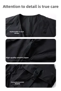 Detail view of V-neckline, metal zipper closure, and tactical utility pockets on black vest
