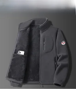 Close-up of deep grey fleece jacket with zip pocket and warm thickened plush lining