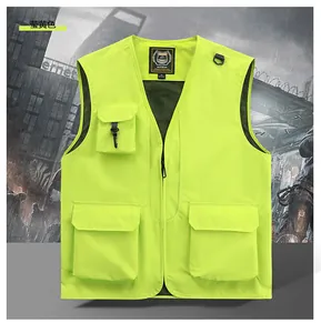 Close-up of the breathable mesh lining and durable fabric on a neon yellow utility vest