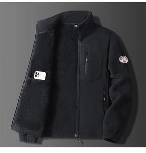 Detail of fleece jacket inner pocket showing storage for a phone and warm thick lining