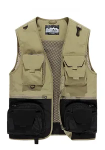 Detail of multi-pocket fishing vest showing breathable mesh lining and khaki nylon fabric