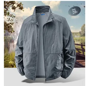 Detail of dark gray lightweight outdoor sun protection jacket with elastic cuffs
