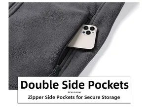 Detail of deep gray fleece jacket showing a secure zippered side pocket with a smartphone inside
