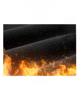 Macro detail of thermal fleece lining with flame graphic for windproof outdoor vest