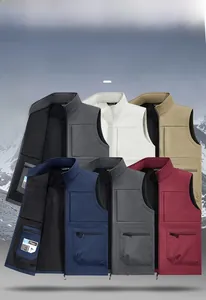 Detail of multi-pocket softshell vest showing white duck down filling and inner pocket