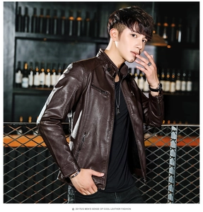 Detail of dark brown slim fit leather jacket with stand collar and metallic zippers