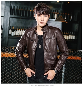 Detail of dark brown faux leather motorcycle jacket with stand collar and metal zippers