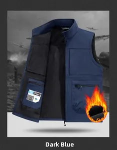 Detail of dark blue outdoor vest featuring thick black fleece lining and zip pocket