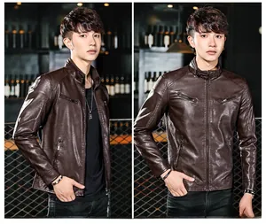 Detail view of dark brown leather jacket with mandarin collar and silver metal zippers