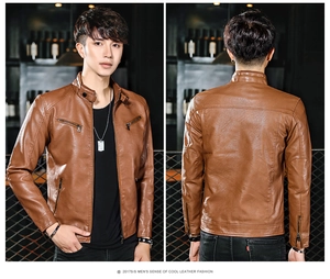 Detail of brown slim fit biker jacket featuring silver zippers and stand collar design