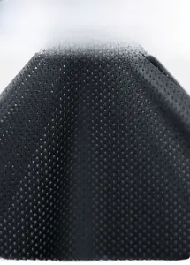 Close-up of black breathable mesh lining for men's lightweight outdoor jacket