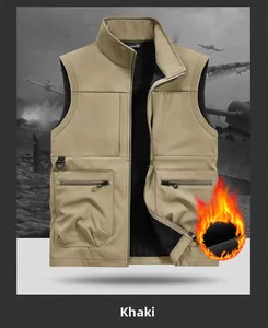 Detail of khaki outdoor vest showing stand collar and warm black fleece lining texture