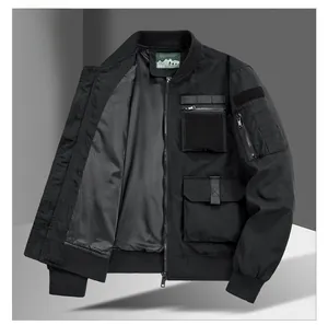 Detailed view of black tactical bomber jacket featuring multi-functional pockets and ribbed trims