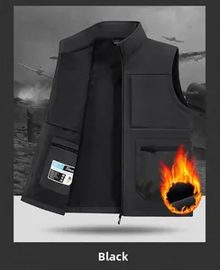 Detail of black tactical outdoor vest showing fleece lining and multi-pocket design