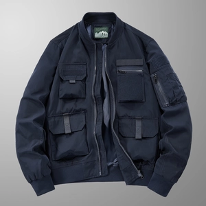 Men's dark blue tactical bomber jacket with multi-pocket utility design and ribbed cuffs