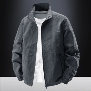Men's dark grey stand collar outdoor casual jacket with a modern lightweight windproof design