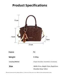 Detailed view of leopard print PU handbag with dimensions 21cm x 15cm x 8cm and beaded charm