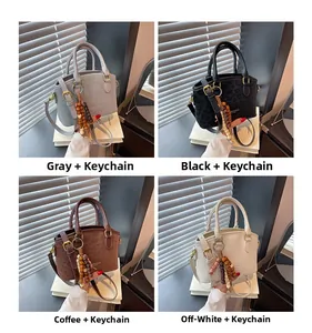 Detailed grid view of leather bucket bags in four colors with leopard print and bead charms