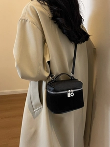 Vintage black mini box crossbody bag featuring textured leather and a suede finish