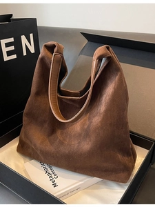 Brown suede hobo tote bag for women with leather straps shown in an elegant gift box set