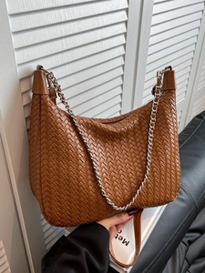 Brown woven hobo shoulder bag with silver chain strap and minimalist leather finish