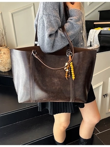Retro dark brown oil wax leather tote bag with colorful wooden bead charm detail
