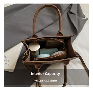 Top view of brown leather bucket bag showing large interior capacity for daily essentials