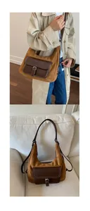 Dettaglio di una borsa vintage a mezzaluna color caramello con tasca anteriore e fibbia