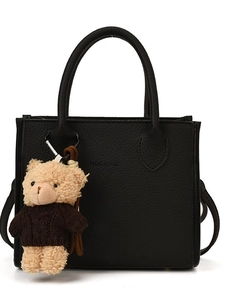Retro black leather bucket bag with litchi texture and cute bear pendant on handle