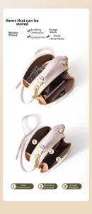 Detailed interior layout of pink crossbody bag showing multi-compartment storage capacity