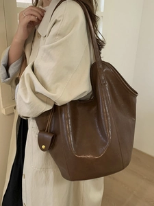 Large dark brown tote bag in vintage PU leather with decorative mini pouch