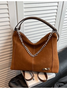 Vintage brown suede tote bag with silver chain detail and dual shoulder straps
