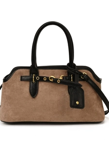 Brown frosted suede crossbody handbag with black handles and gold metal eyelets for women