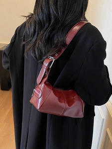 Chic burgundy hobo shoulder bag with glossy patent leather finish for stylish women