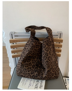 Close-up of leopard print tote bag fabric showing thick high-quality texture and pattern
