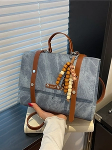 Sac à dos bleu en cuir vintage pour femmes avec boucles en métal rétro et style décontracté