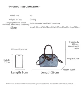 Detail view of light blue denim texture PU handbag with size measurements and phone reference