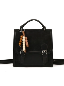 Retro black leather backpack for women with wooden bead charms and silver buckles