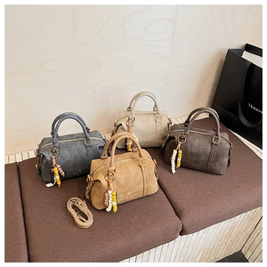 Boston style handbags in four colors with beaded charms and detachable shoulder straps