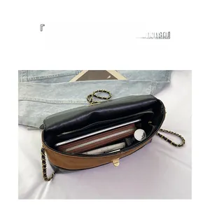 Interior view showing the large storage capacity and compartments of the chain bag