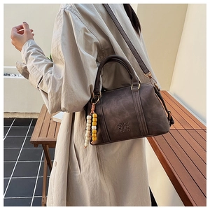 Retro Boston bag in dark grey matte leather with adjustable strap and beaded charm details