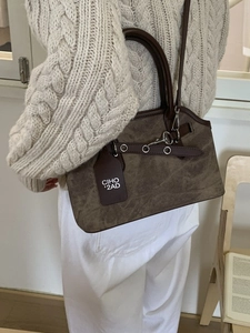 Retro brown suede crossbody bag with leather trim and decorative metal hardware