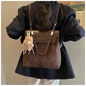 Retro brown suede backpack with vintage leather flap and cute plush bear accessory