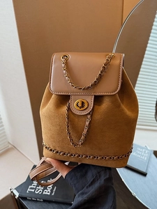 Stylish caramel suede bucket backpack for women with gold twist lock and leather chain detail