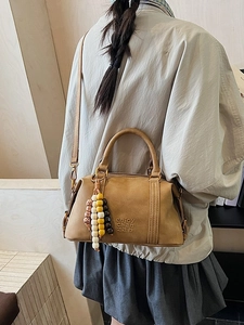 Vintage khaki leather Boston crossbody bag with decorative tassels for women