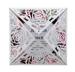Laser cut white rose wedding invitation suite with floral inner card and greeting