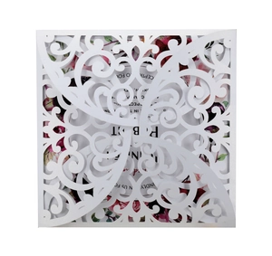 Elegant laser cut white floral wedding invitation card with pearlescent finish and inserts