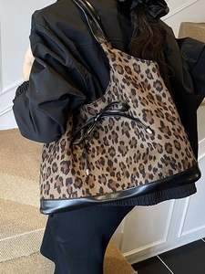Stylish large leopard print tote bag with black leather trim and bow for women