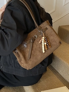 Retro brown faux suede tote bag with wooden bead tassel and slim shoulder strap