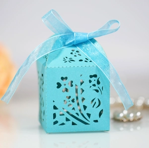 Elegant light blue laser-cut flower candy box with matching silk ribbon for weddings